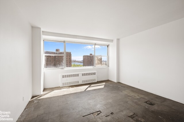 185 Park Row Unit 12E, New York City, NY 10038 - unfurnished room featuring radiator