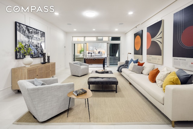 living room featuring recessed lighting and tile patterned floors