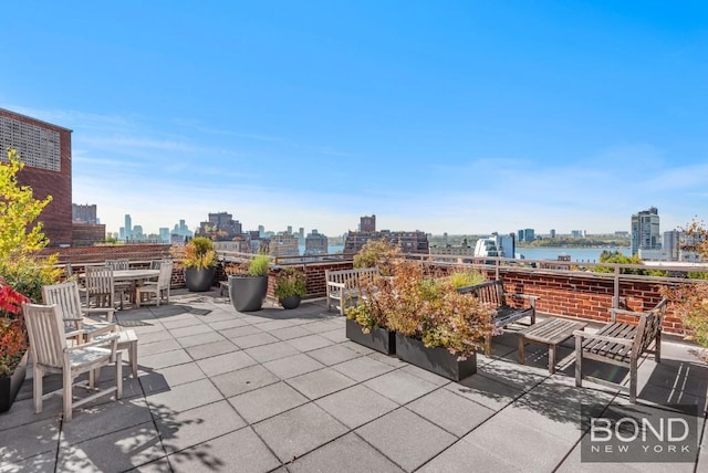 view of patio with a water view