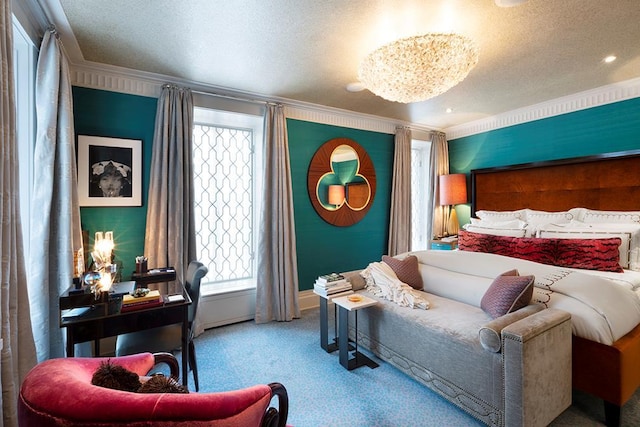 bedroom featuring baseboards, a textured ceiling, crown molding, and carpet