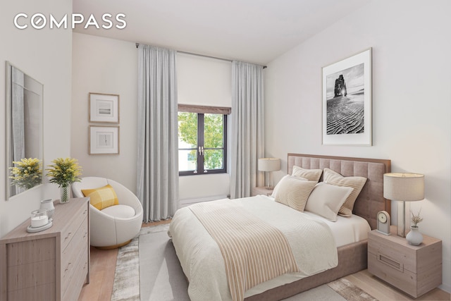 215 Sullivan St Unit Thc, New York City, NY 10012 - bedroom with light wood-style flooring