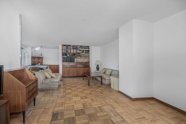 living room featuring light parquet flooring