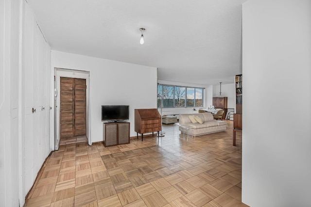 living room with light parquet floors