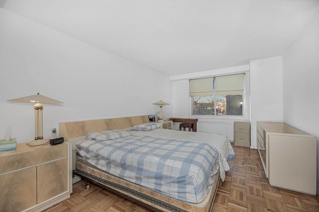 bedroom with parquet floors