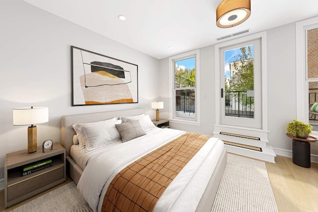 bedroom featuring light hardwood / wood-style flooring