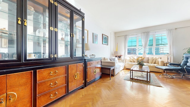 sitting room featuring light parquet floors