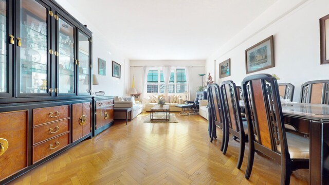 bedroom featuring light parquet floors