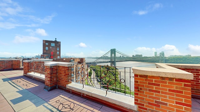 view of patio / terrace featuring a water view