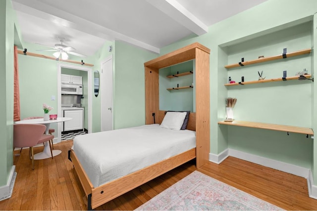 bedroom featuring ceiling fan and hardwood / wood-style flooring