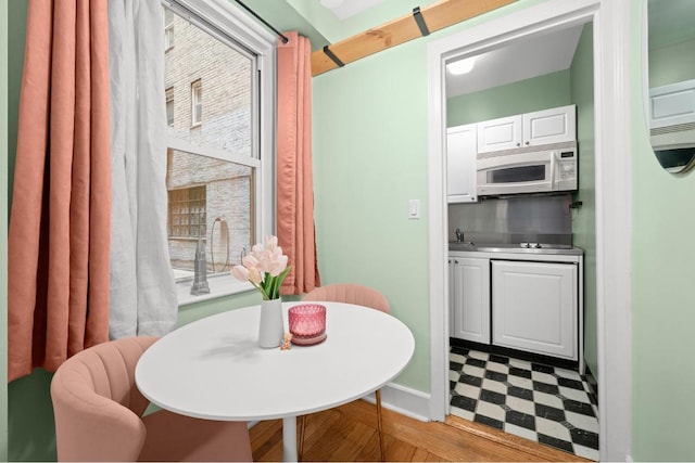 dining area with tile patterned floors