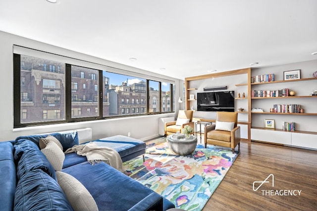 living room with wood-type flooring