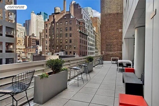 balcony featuring a view of city