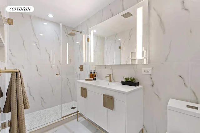 bathroom with a marble finish shower, visible vents, toilet, marble finish floor, and vanity