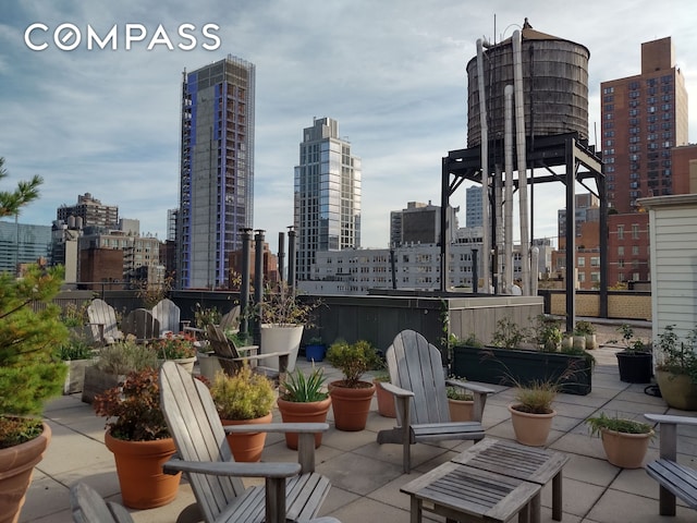 view of patio / terrace featuring a view of city