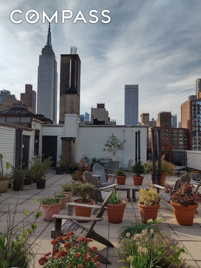 view of patio / terrace with a city view