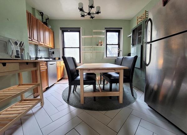 dining space featuring an inviting chandelier