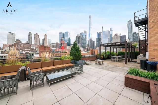 view of patio / terrace featuring a pergola and outdoor lounge area