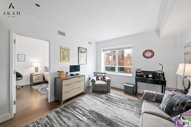 living room with dark hardwood / wood-style floors