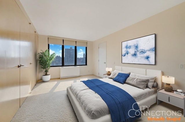 bedroom with light colored carpet