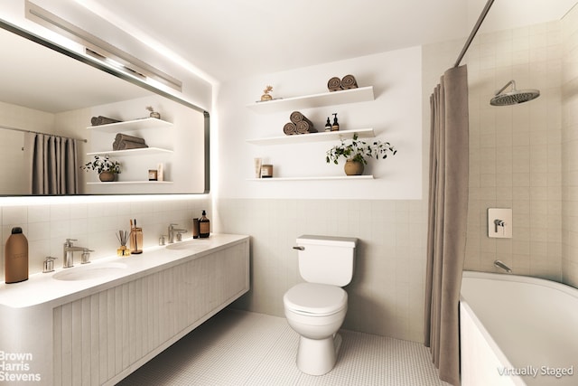 full bathroom featuring shower / bathtub combination with curtain, tile patterned floors, toilet, tile walls, and vanity