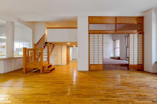 spare room featuring light wood-type flooring