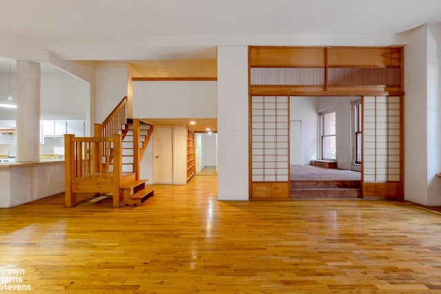 spare room featuring light hardwood / wood-style floors