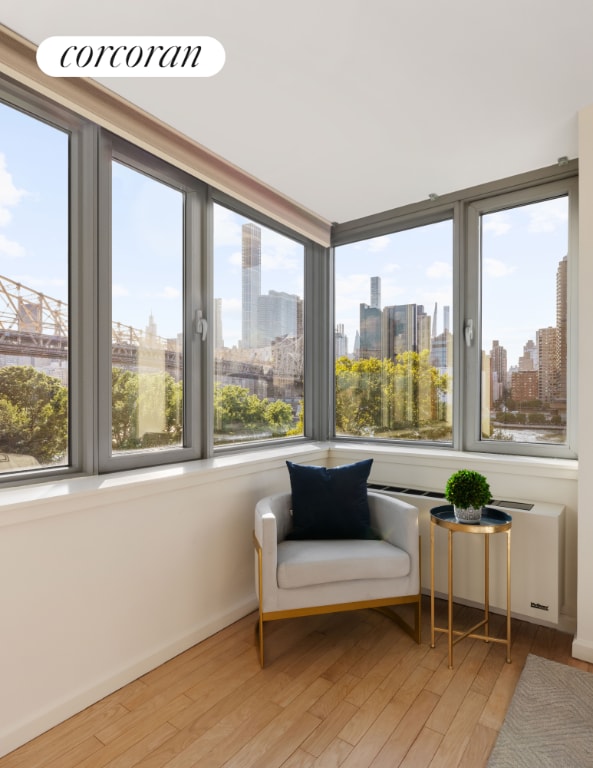 sunroom / solarium featuring radiator