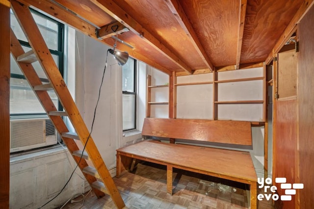 basement with cooling unit and parquet flooring