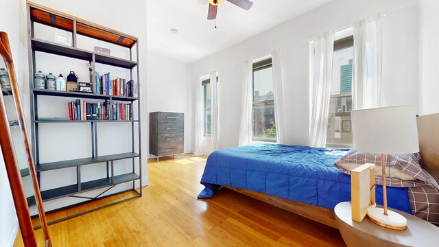 563 W 182nd St, New York City, NY 10033 - bedroom with wood finished floors and ceiling fan