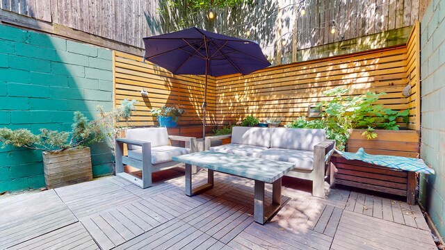 563 W 182nd St, New York City, NY 10033 - wooden terrace with an outdoor living space