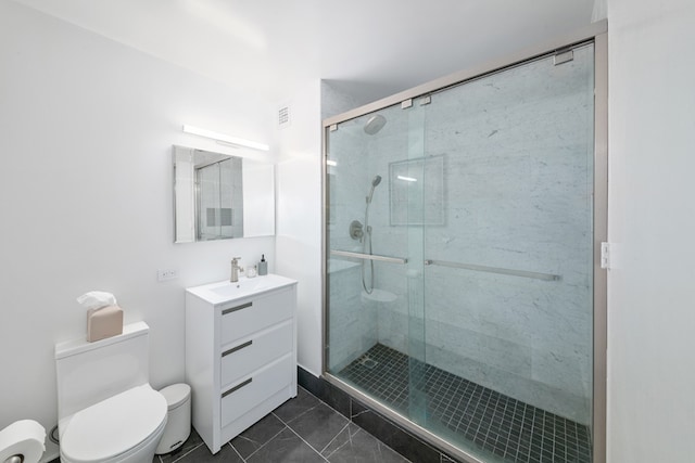 full bath with a stall shower, visible vents, vanity, and toilet