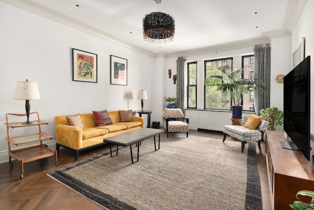 living room with dark parquet flooring and ornamental molding