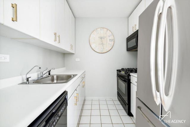 kitchen featuring light tile patterned floors, sink, white cabinets, and black appliances