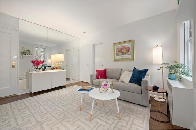 living room with light hardwood / wood-style floors