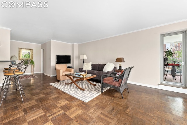 living room featuring plenty of natural light, crown molding, and dark parquet flooring