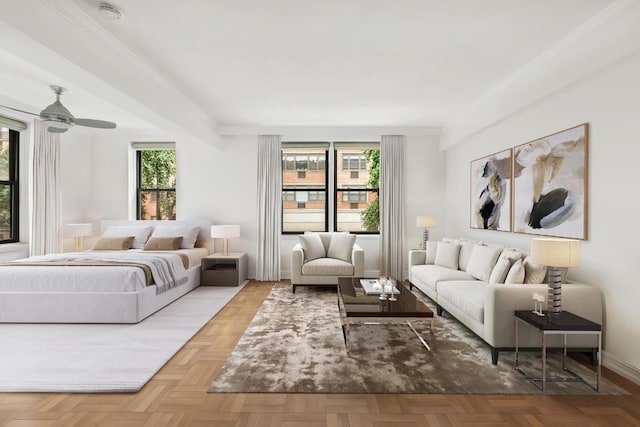 living room with ceiling fan, a healthy amount of sunlight, and light parquet flooring