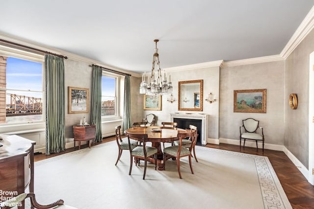 dining space featuring parquet flooring and ornamental molding