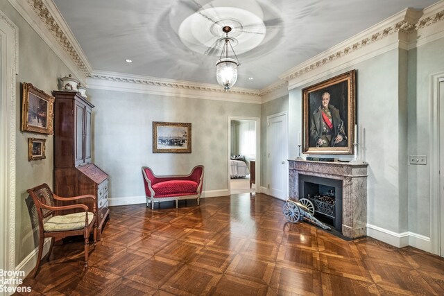 bedroom featuring ornamental molding and light colored carpet