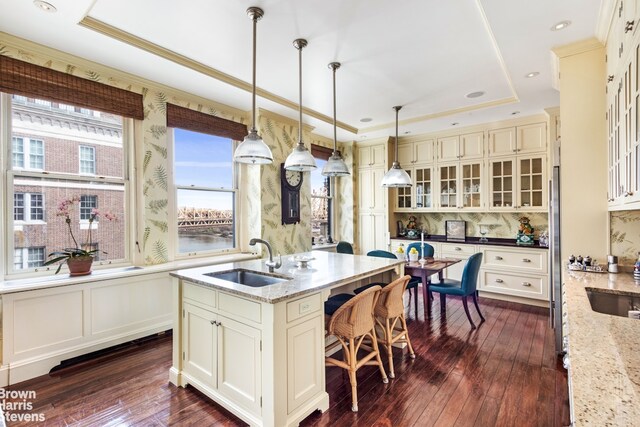 bathroom with a shower with door, crown molding, vanity, and tile patterned flooring