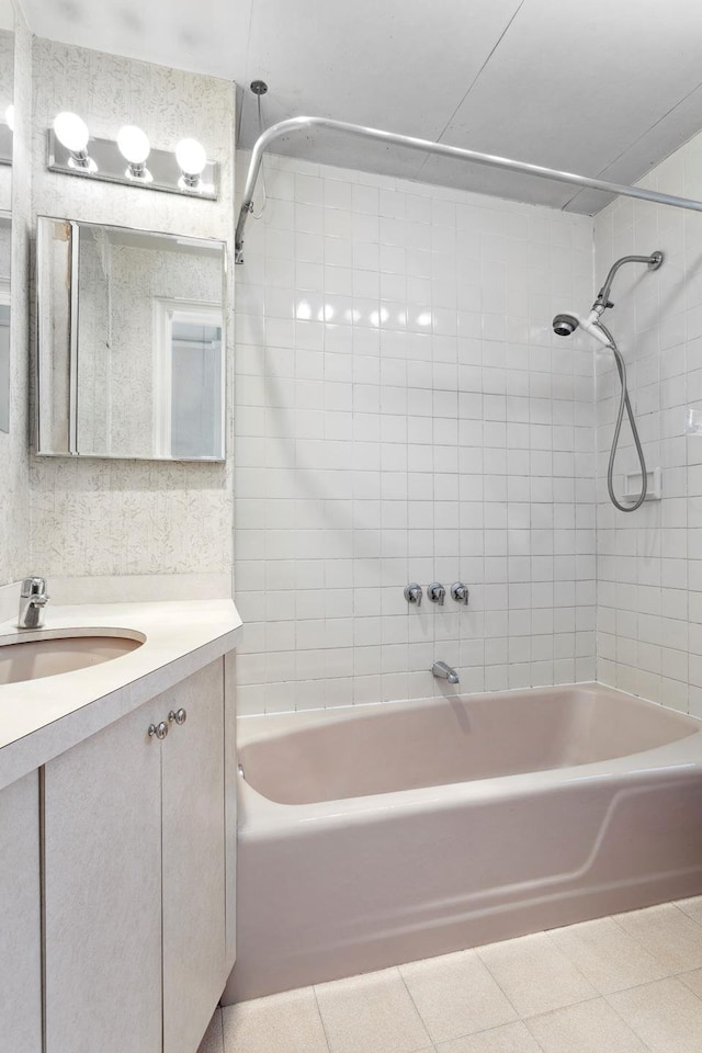 full bathroom with shower / bath combination, tile patterned flooring, and vanity