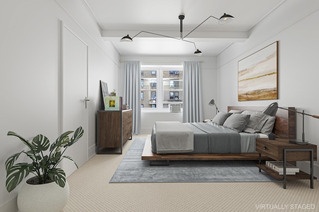 bedroom with light carpet and baseboards