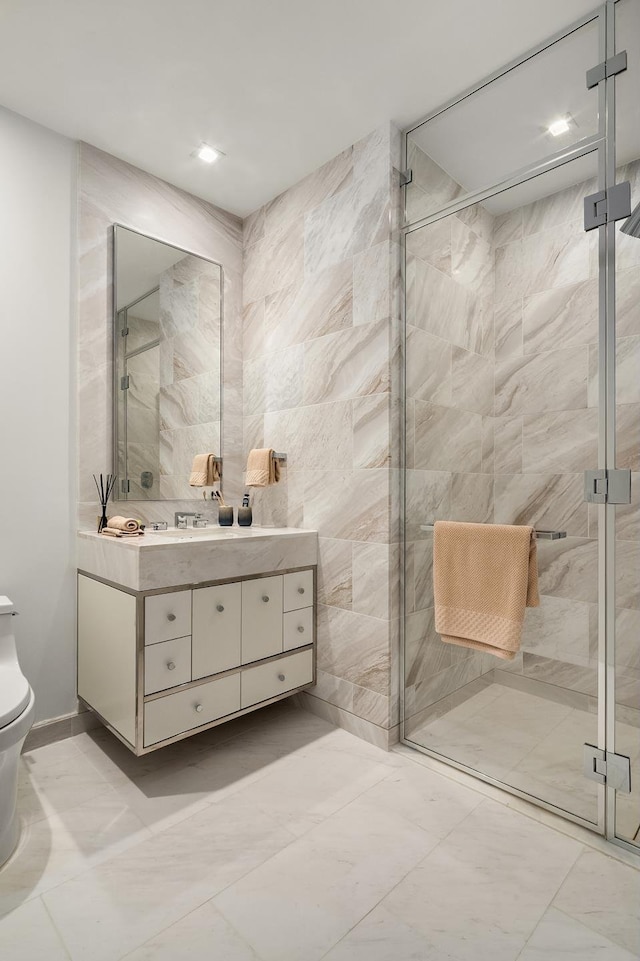 bathroom featuring a stall shower and toilet