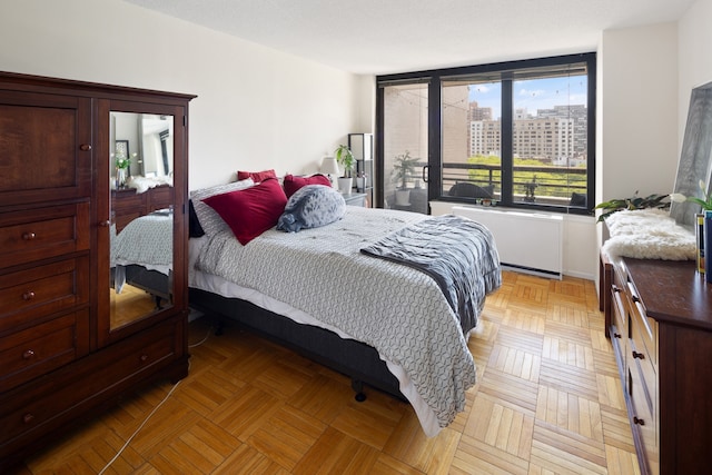 bedroom with a city view