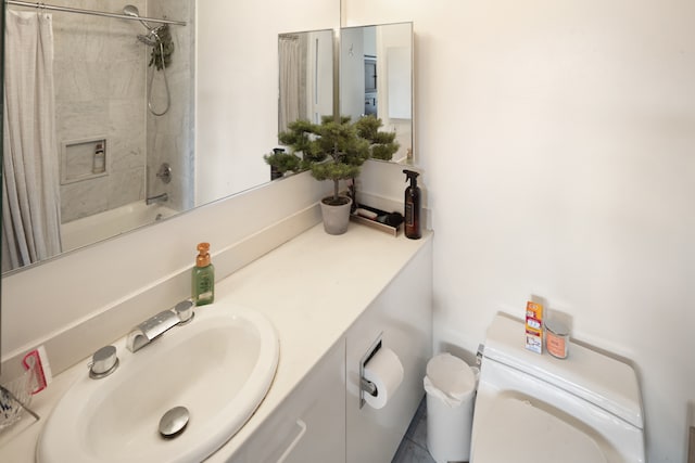 full bath featuring toilet, shower / tub combo with curtain, and vanity