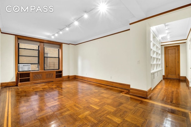 unfurnished living room featuring parquet floors, crown molding, and rail lighting