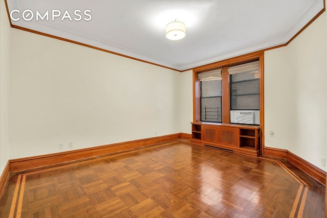 unfurnished room featuring crown molding and parquet floors