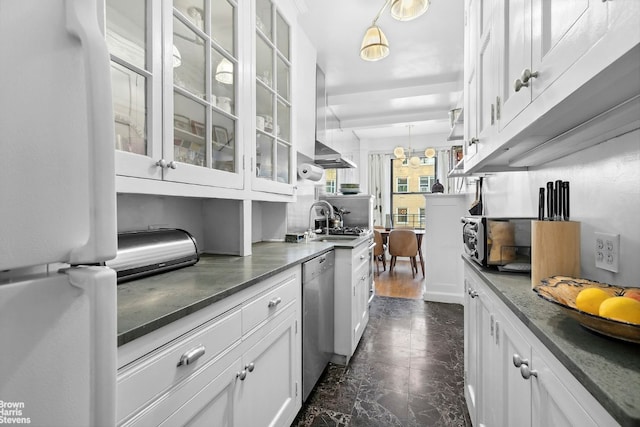 kitchen featuring dishwasher, hanging light fixtures, white fridge, and white cabinets