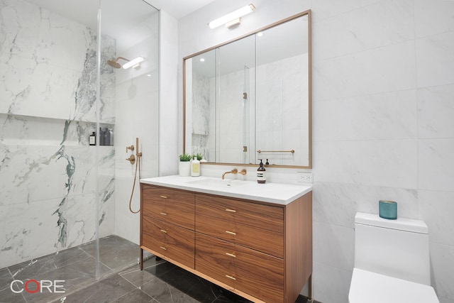 full bath with tile walls, toilet, and a marble finish shower