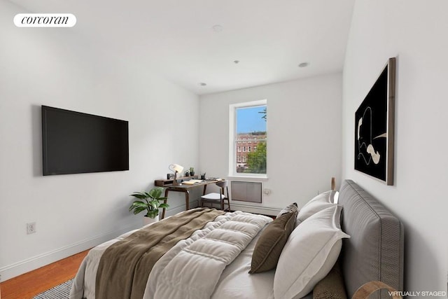 bedroom featuring hardwood / wood-style floors