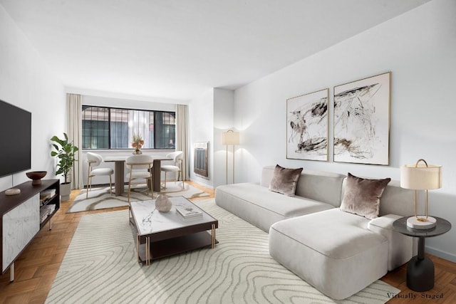 living room featuring light parquet flooring